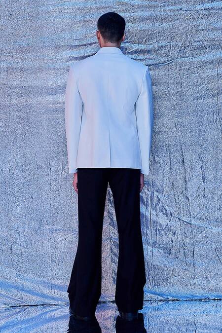 Shop_Line Out Line_White Cotton Embroidered Fringe Tassels Asymmetric Notched Collar Jacket_at_Aza_Fashions