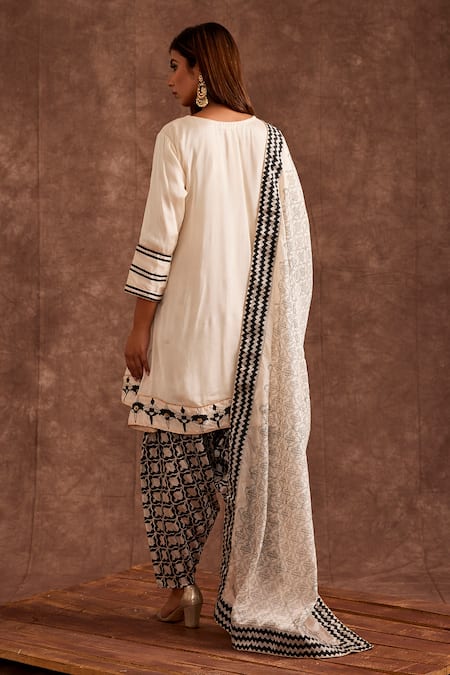 Shop The Home Affair White Chiffon Sequins, Tassels, Monochrome Anghrakha Kurta Dhoti Pant Set at Aza Fashions Shop_The Home Affair_White Chiffon Sequins, Tassels, Monochrome Anghrakha Kurta Dhoti Pant Set _at_Aza_Fashions