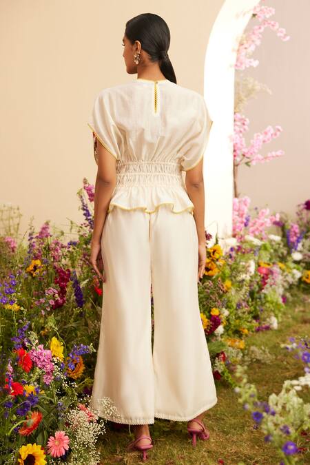 Shop Chandrima Ivory Chanderi Embroidery, Tassels Round Neck Floral Patch Work Top at Aza Fashions Shop_Chandrima_Ivory Chanderi Embroidery, Tassels Round Neck Floral Patch Work Top_at_Aza_Fashions