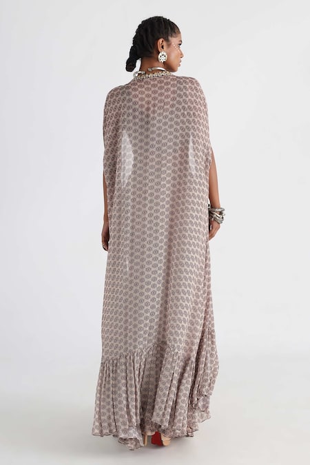 Shop Smriti By Anju Agarwal Off White Bamboo, Silk, Viscose, Floral Print Cape And Tiered Flared Pant Set at Aza Fashions Shop_Smriti By Anju Agarwal_Off White Bamboo, Silk, Viscose, Floral Print Cape And Tiered Flared Pant Set _at_Aza_Fashions