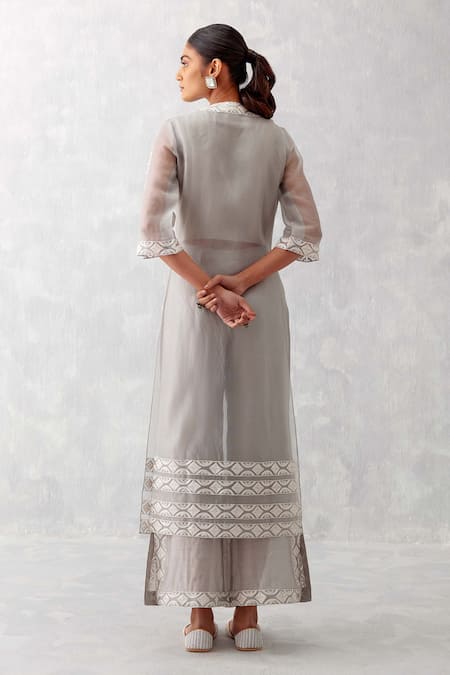 Shop Devnaagri Grey Silk Organza Embroidery V-neck Kurta And Slit Palazzo Set at Aza Fashions Shop_Devnaagri_Grey Silk Organza Embroidery V-neck Kurta And Slit Palazzo Set _at_Aza_Fashions