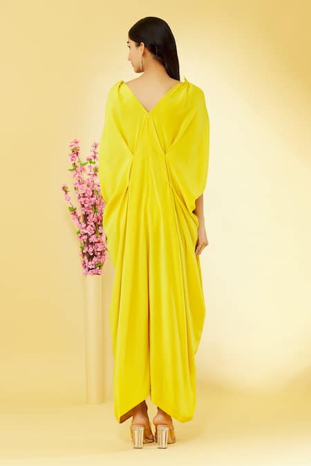 Shop Megha Garg Yellow Pure Crepe V Neck Cowl Draped Jumpsuit at Aza Fashions Shop_Megha Garg_Yellow Pure Crepe V Neck Cowl Draped Jumpsuit _at_Aza_Fashions