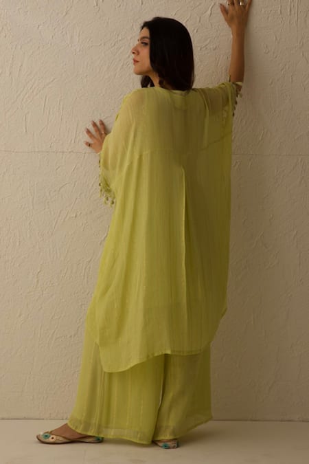 Shop Chandbari Green Georgette Embroidery V-neck Chanderi Asymmetric Kaftan And Flared Pant Set at Aza Fashions Shop_Chandbari_Green Georgette Embroidery V-neck Chanderi Asymmetric Kaftan And Flared Pant Set_at_Aza_Fashions