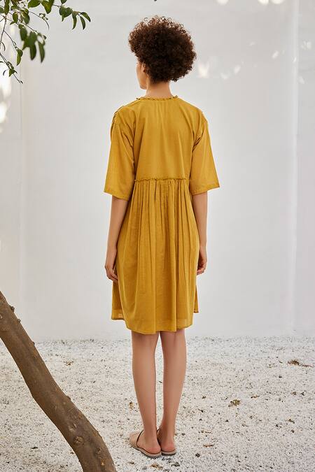 Shop_Kharakapas_Yellow Cotton Round Neck Gathered Panel Mulmul Dress _at_Aza_Fashions