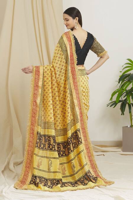 Shop Surendri Yellow Kotadoria Printed Floral V Neck Saree With Blouse at Aza Fashions Shop_Surendri_Yellow Kotadoria Printed Floral V Neck Saree With Blouse_at_Aza_Fashions