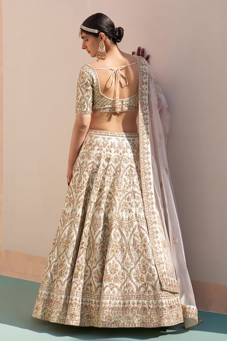 Shop Angad Singh Ivory Silk Cut Work, Sequins, Floral Embroidered Zardozi Bridal Lehenga Set at Aza Fashions Shop_Angad Singh_Ivory Silk Cut Work, Sequins, Floral Embroidered Zardozi Bridal Lehenga Set _at_Aza_Fashions