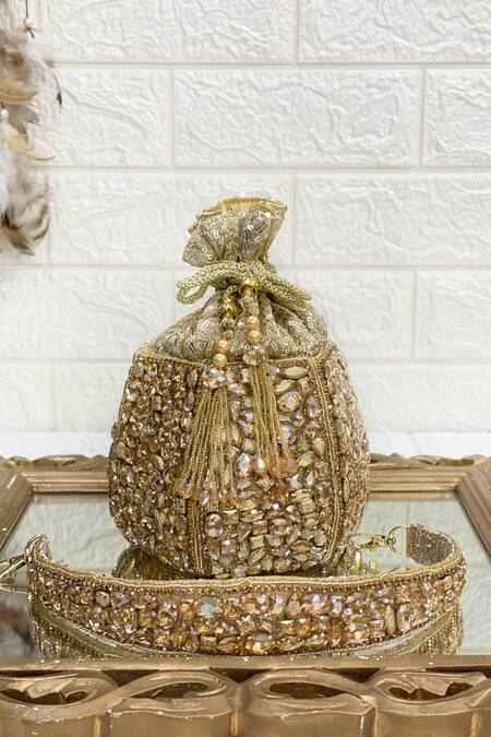 Shop Kainiche By Mehak Gold Embellished Pearl Potli at Aza Fashions Shop_Kainiche By Mehak_Gold Embellished Pearl Potli_at_Aza_Fashions