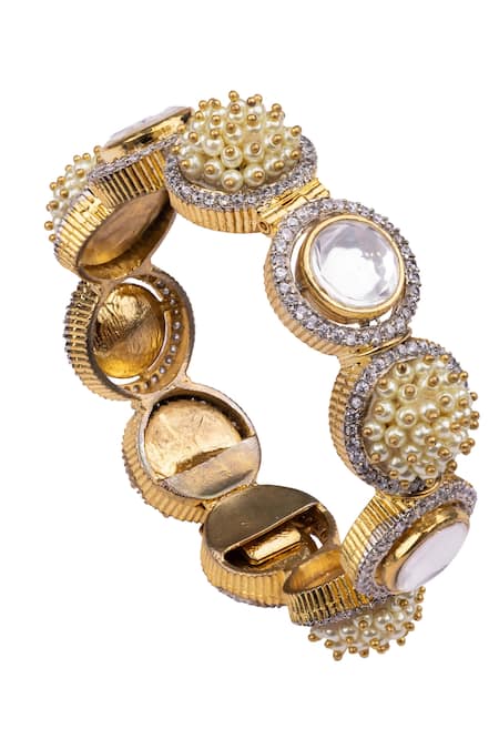 Shop Vasundhara Gold Plated Pearls, Diamonds, Stones And Studded Bracelet at Aza Fashions Shop_Vasundhara_Gold Plated Pearls, Diamonds, Stones And Studded Bracelet _at_Aza_Fashions