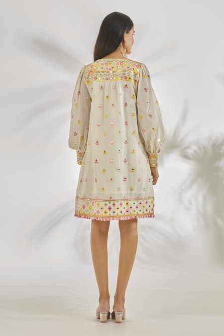 Shop_Gopi Vaid_Ivory Cotton Tassels, Pom-poms Round Shehnaz Mirror And Thread Embroidered Dress _at_Aza_Fashions