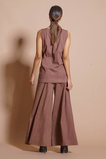 Shop Stoique Orange Cotton V-neck Butter Sleeveless Wrap Top at Aza Fashions Shop_Stoique_Orange Cotton V-neck Butter Sleeveless Wrap Top _at_Aza_Fashions