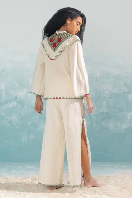 Shop Ikai By Ragini Ahuja Ivory Cotton Applique, Cut Work High Neck Nile Yoke Cut-work Top at Aza Fashions Shop_Ikai By Ragini Ahuja_Ivory Cotton Applique, Cut Work High Neck Nile Yoke Cut-work Top_at_Aza_Fashions