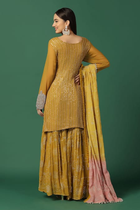 Shop Two Sisters By Gyans Yellow Georgette Sequins, Embroidery Round Neck And Resham Kurta Sharara Set at Aza Fashions Shop_Two Sisters By Gyans_Yellow Georgette Sequins, Embroidery Round Neck And Resham Kurta Sharara Set _at_Aza_Fashions