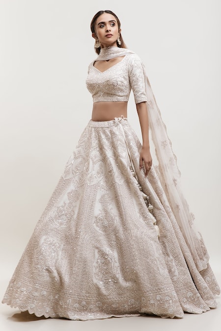 Shop Kalighata Ivory Silk Cut Work, Sequins V-neck Raw Embellished Bridal Lehenga Set at Aza Fashions Shop_Kalighata_Ivory Silk Cut Work, Sequins V-neck Raw Embellished Bridal Lehenga Set _at_Aza_Fashions