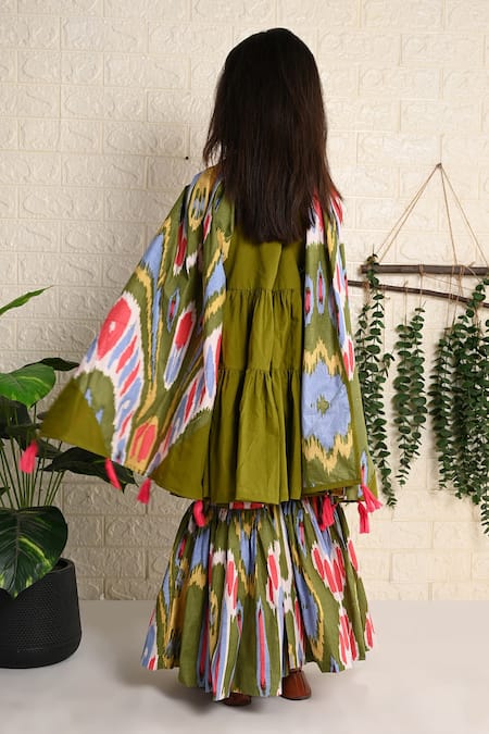 Shop THE COTTON STAPLE Green Cotton Pom-poms Nature Sleeveless Kurta And Sharara Set at Aza Fashions Shop_THE COTTON STAPLE_Green Cotton Pom-poms Nature Sleeveless Kurta And Sharara Set _at_Aza_Fashions