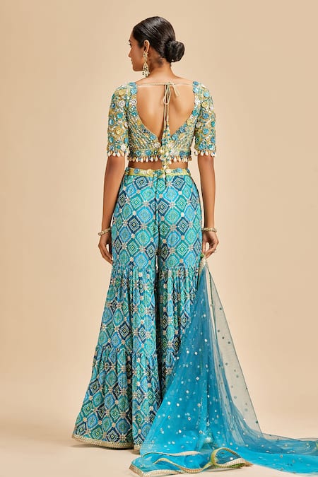 Shop Nitika Gujral Blue Sharara Chinon Bandhni And Blouse & Dupatta Net Embroidery Pattern Set at Aza Fashions Shop_Nitika Gujral_Blue Sharara Chinon Bandhni And Blouse & Dupatta Net Embroidery Pattern Set _at_Aza_Fashions