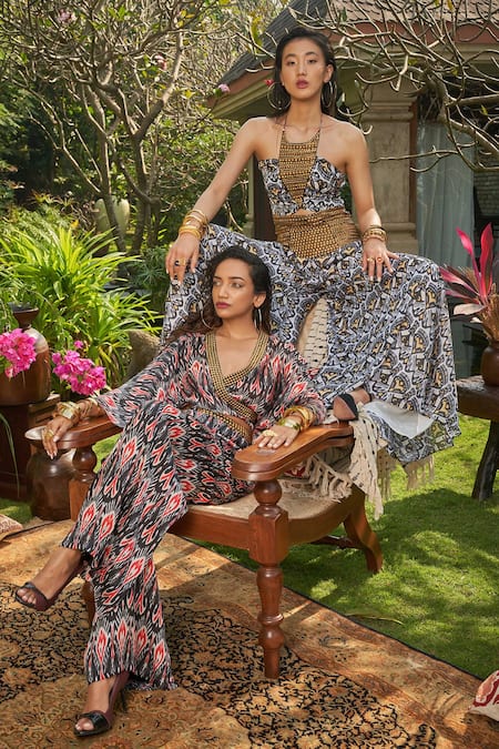 Shop_Surily G_White Satin Georgette Printed Ikat Halter Neck Jumpsuit  _at_Aza_Fashions