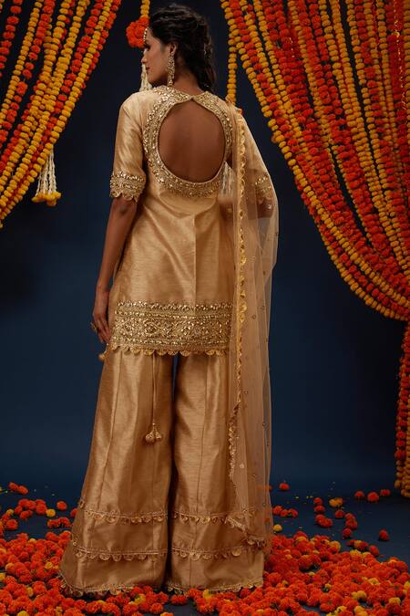 Shop Preeti S Kapoor Beige Silk, Net Sequins, Embroidery, Gota Patti Round Neck Kurta Sharara Set at Aza Fashions Shop_Preeti S Kapoor_Beige Silk, Net Sequins, Embroidery, Gota Patti Round Neck Kurta Sharara Set _at_Aza_Fashions