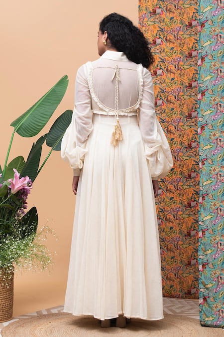 Shop Rishi and Vibhuti Ivory Cotton, Linen Pearls, Tassels Round Kellen Jute Cape And Straight Pant Set at Aza Fashions Shop_Rishi and Vibhuti_Ivory Cotton, Linen Pearls, Tassels Round Kellen Jute Cape And Straight Pant Set _at_Aza_Fashions