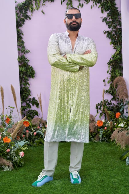 Shop Pooja Bagaria Yellow Spandex, Crepe Sequins Embellished Kurta With Pant at Aza Fashions Shop_Pooja Bagaria_Yellow Spandex, Crepe Sequins Embellished Kurta With Pant _at_Aza_Fashions