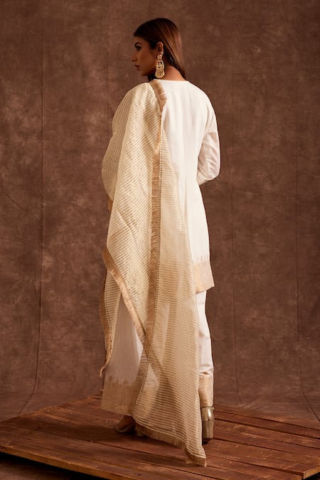 Shop The Home Affair White Chanderi Zari Round Neck Banarasi Pintucked Kurta Sharara Set at Aza Fashions Shop_The Home Affair_White Chanderi Zari Round Neck Banarasi Pintucked Kurta Sharara Set _at_Aza_Fashions
