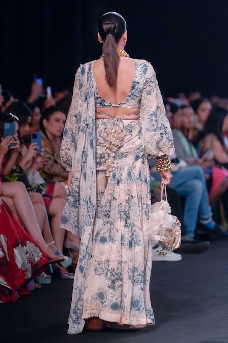 Shop Bhumika Sharma Beige Georgette Pearls, Tassels, Blossom Print Pre-draped Palazzo Saree Set at Aza Fashions Shop_Bhumika Sharma_Beige Georgette Pearls, Tassels, Blossom Print Pre-draped Palazzo Saree Set _at_Aza_Fashions