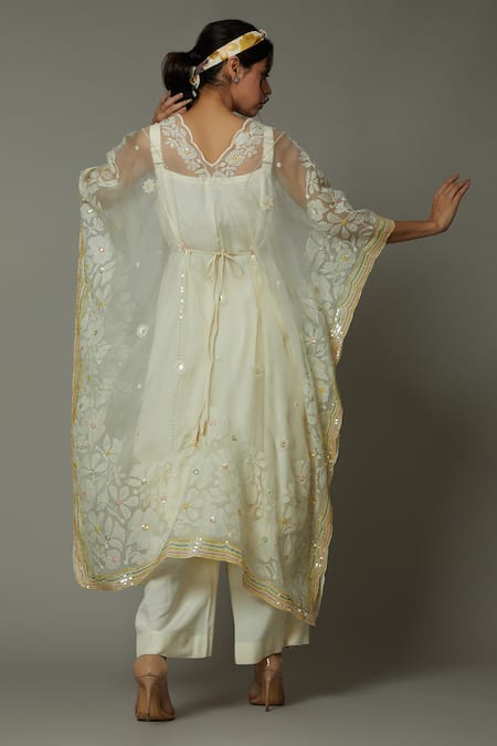 I Am Design Ivory Silk Organza Floral Appliques, Sequins French Vanilla Kaftan And Pant Set Online at Aza Fashions I Am Design_Ivory Silk Organza Floral Appliques, Sequins French Vanilla Kaftan And Pant Set _Online_at_Aza_Fashions
