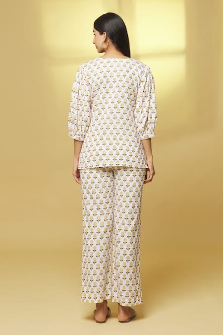 Shop Kalakaari By Sagarika White Cotton Embroidery Button-down Neck Floral Print Top And Pant Set at Aza Fashions Shop_Kalakaari By Sagarika_White Cotton Embroidery Button-down Neck Floral Print Top And Pant Set _at_Aza_Fashions