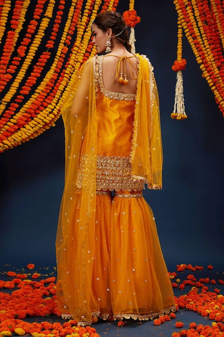 Shop Preeti S Kapoor Yellow Silk, Net, Denim Gota Patti Square Neck Embroidered Kurta Gharara Set at Aza Fashions Shop_Preeti S Kapoor_Yellow Silk, Net, Denim Gota Patti Square Neck Embroidered Kurta Gharara Set _at_Aza_Fashions