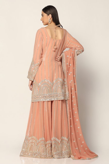 Shop Two Sisters By Gyans Pink Georgette Sequins, Zari Mandarin Collar Embroidered Kurta Sharara Set at Aza Fashions Shop_Two Sisters By Gyans_Pink Georgette Sequins, Zari Mandarin Collar Embroidered Kurta Sharara Set _at_Aza_Fashions