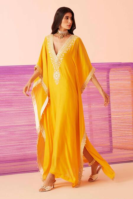 Shop Sureena Chowdhri Yellow Muslin Embroidered Dori Deep V Neck Yoke Kaftan at Aza Fashions Shop_Sureena Chowdhri_Yellow Muslin Embroidered Dori Deep V Neck Yoke Kaftan_at_Aza_Fashions