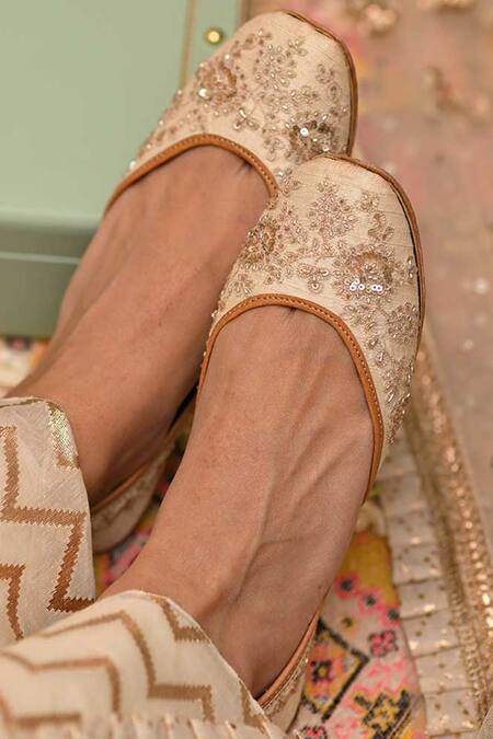 Shop Coral Haze Ivory Sequin Floral Zardozi Juttis at Aza Fashions Shop_Coral Haze_Ivory Sequin Floral Zardozi Juttis_at_Aza_Fashions