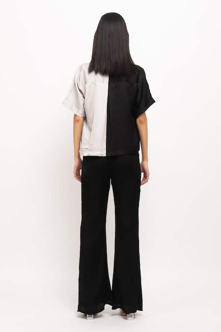 Shop Neora By Nehal Chopra Black Silk Cut Work, Ruffles Collared, Halter Neck Buttoned Shirt Pant Set at Aza Fashions Shop_Neora By Nehal Chopra_Black Silk Cut Work, Ruffles Collared, Halter Neck Buttoned Shirt Pant Set _at_Aza_Fashions