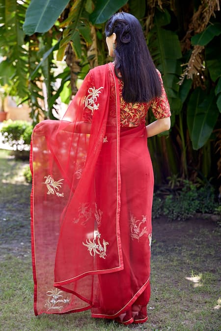 Shop Atelier Shikaarbagh Red Silk Organza, Brocade Embroidery, Zari Round Neck Flower Placement Saree at Aza Fashions Shop_Atelier Shikaarbagh_Red Silk Organza, Brocade Embroidery, Zari Round Neck Flower Placement Saree _at_Aza_Fashions
