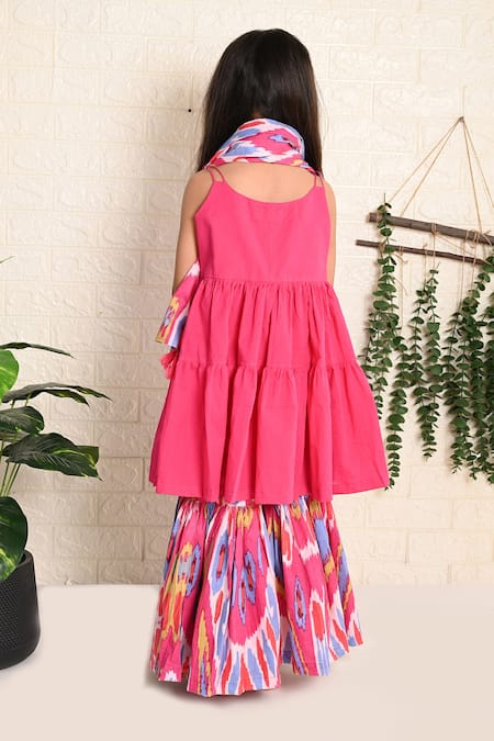 Shop THE COTTON STAPLE Pink Cotton Tassels Picasso Solid Kurta Sharara Set at Aza Fashions Shop_THE COTTON STAPLE_Pink Cotton Tassels Picasso Solid Kurta Sharara Set _at_Aza_Fashions