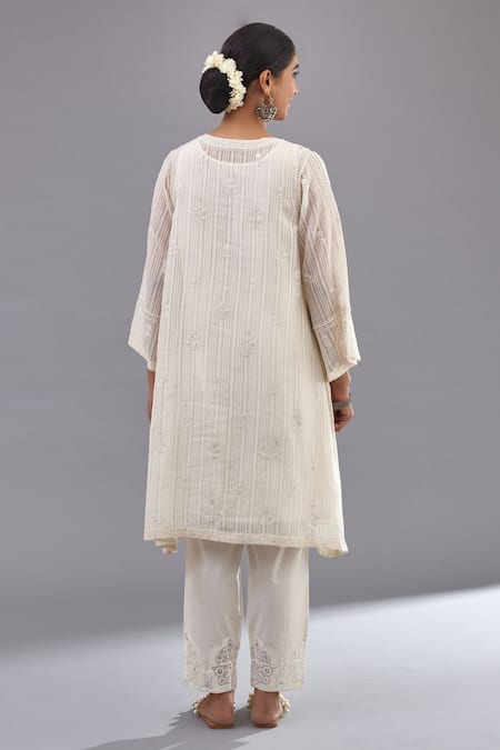 Shop Kora Off White Cotton Sequins, Embroidery Mandarin Collar A-line Kurta Pant Set at Aza Fashions Shop_Kora_Off White Cotton Sequins, Embroidery Mandarin Collar A-line Kurta Pant Set _at_Aza_Fashions