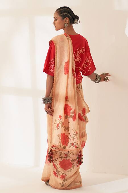 Shop Kasturi Kundal Orange Linen Tassels, Dhoop Pure Handloom Saree With Unstitched Blouse at Aza Fashions Shop_Kasturi Kundal_Orange Linen Tassels, Dhoop Pure Handloom Saree With Unstitched Blouse_at_Aza_Fashions