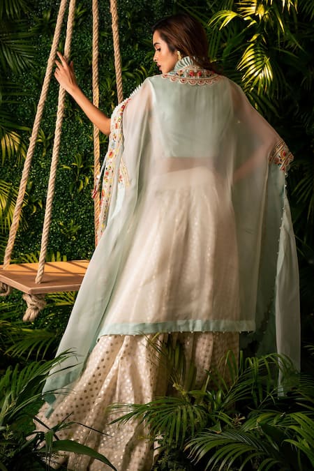 Shop Pallavi Poddar Blue Gingham Embroidery, Tassels Round Neck Mughal Garden Cape And Lehenga Set at Aza Fashions Shop_Pallavi Poddar_Blue Gingham Embroidery, Tassels Round Neck Mughal Garden Cape And Lehenga Set _at_Aza_Fashions