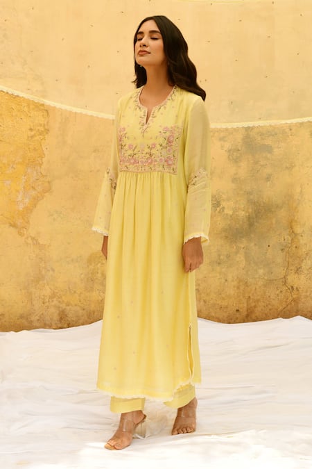 Shop Label Niti Bothra Yellow Silk Embroidery Split V-neck Gathered Kurta And Palazzo Set at Aza Fashions Shop_Label Niti Bothra_Yellow Silk Embroidery Split V-neck Gathered Kurta And Palazzo Set _at_Aza_Fashions