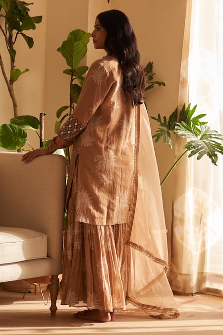 Shop Rekha Agra Brown Chanderi Mirrors, Embroidery V-neck Floral Bloom Print Kurta And Gharara Set at Aza Fashions Shop_Rekha Agra_Brown Chanderi Mirrors, Embroidery V-neck Floral Bloom Print Kurta And Gharara Set _at_Aza_Fashions