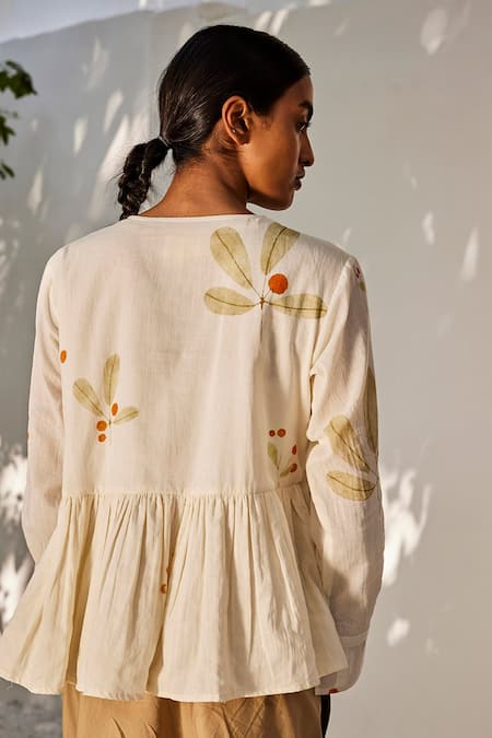 Shop_Kharakapas_Cream Cotton Embroidery Round Neck Secret Daze Floral Pattern Mul Top _at_Aza_Fashions