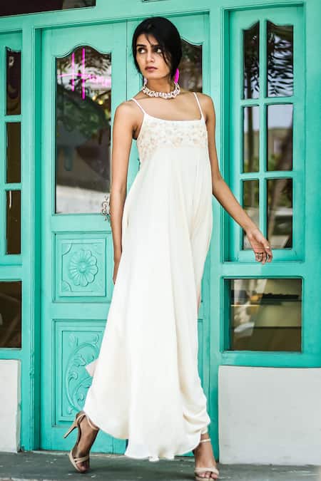 Shop PIRI INDIA Ivory Georgette Beads, Pearls, Sequins Hand Embroidered Strappy Cowl Jumpsuit at Aza Fashions Shop_PIRI INDIA_Ivory Georgette Beads, Pearls, Sequins Hand Embroidered Strappy Cowl Jumpsuit _at_Aza_Fashions