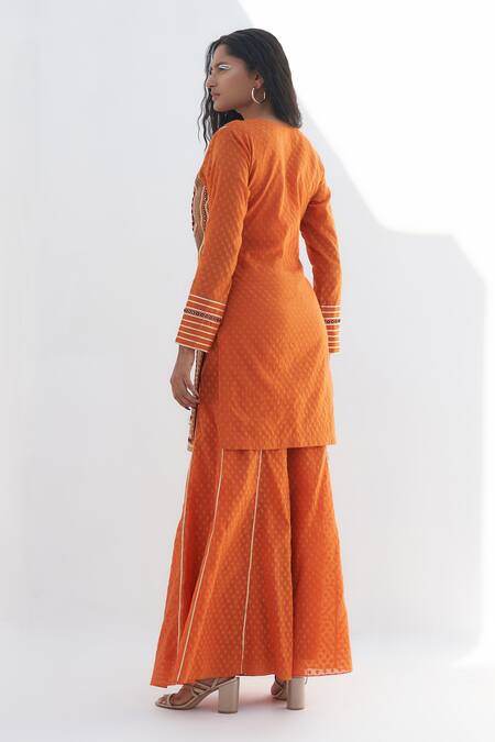 Shop Nadima Saqib Orange Chanderi, Jacquard Embroidery Split V-neck Mirror And Resham Kurta at Aza Fashions Shop_Nadima Saqib_Orange Chanderi, Jacquard Embroidery Split V-neck Mirror And Resham Kurta _at_Aza_Fashions