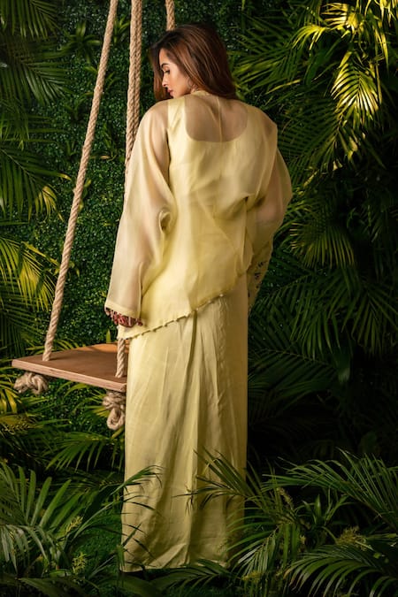 Shop Pallavi Poddar Yellow Organza, Satin Pearls, Tassels Garland Embroidered Top And Draped Skirt Set at Aza Fashions Shop_Pallavi Poddar_Yellow Organza, Satin Pearls, Tassels Garland Embroidered Top And Draped Skirt Set _at_Aza_Fashions