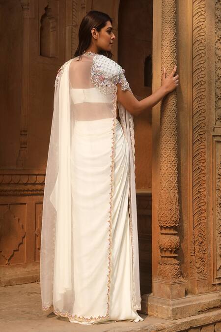 Shop Dheeru Taneja Ivory Organza, Chiffon Sequins Scoop Neck Aazira Pre-draped Saree Set With Cape at Aza Fashions Shop_Dheeru Taneja_Ivory Organza, Chiffon Sequins Scoop Neck Aazira Pre-draped Saree Set With Cape _at_Aza_Fashions
