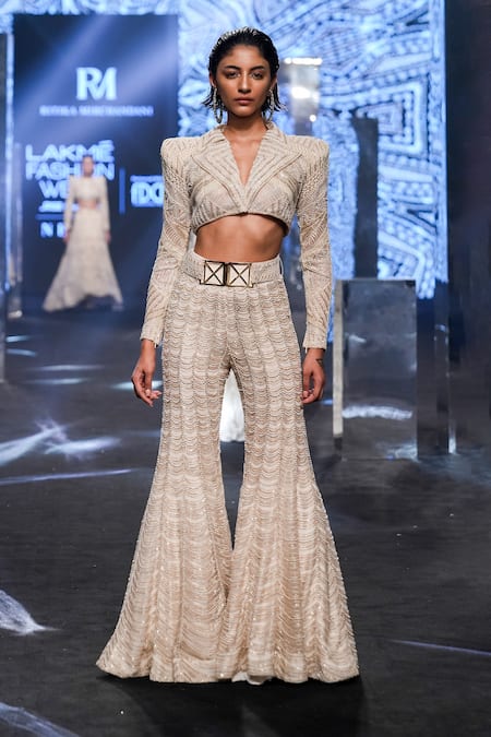 Shop Ritika Mirchandani Beige Net Embroidery Bead Notched Tyla Cropped Blazer And Sharara Set at Aza Fashions Shop_Ritika Mirchandani_Beige Net Embroidery Bead Notched Tyla Cropped Blazer And Sharara Set _at_Aza_Fashions