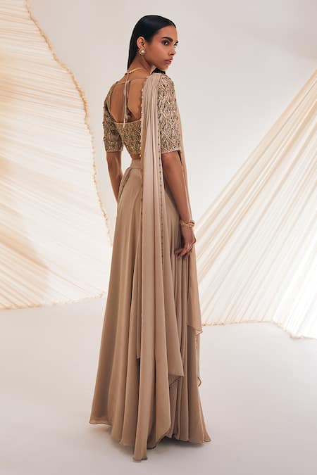 Shop Divya Aggarwal Beige Silk, Chiffon Crystals, Gota Patti, Taylen Pre-draped Saree With Blouse at Aza Fashions Shop_Divya Aggarwal_Beige Silk, Chiffon Crystals, Gota Patti, Taylen Pre-draped Saree With Blouse _at_Aza_Fashions