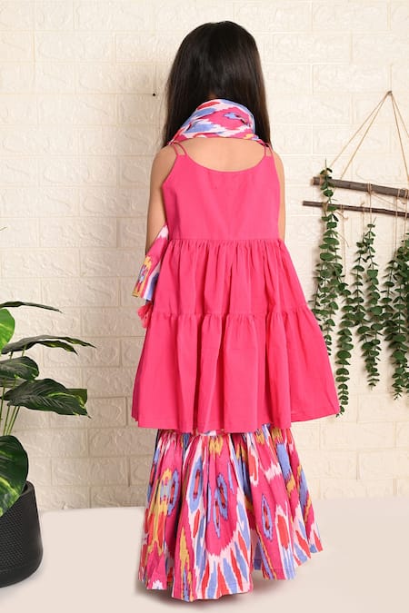 Shop THE COTTON STAPLE Pink Cotton Pom-poms, Tassels Rosette Tiered Kurta With Sharara at Aza Fashions Shop_THE COTTON STAPLE_Pink Cotton Pom-poms, Tassels Rosette Tiered Kurta With Sharara _at_Aza_Fashions