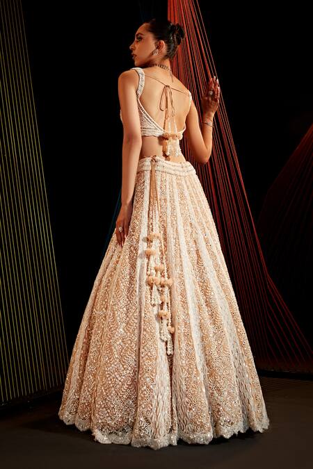 Shop Roqa Peach Net Pearls, Mirrors V-neck Embroidered Lehenga Blouse Set at Aza Fashions Shop_Roqa_Peach Net Pearls, Mirrors V-neck Embroidered Lehenga Blouse Set_at_Aza_Fashions