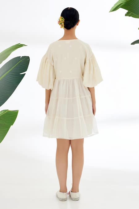 Shop Nikasha Cream Handwoven Jamdani Cotton Deep V Neck Tiered Dress at Aza Fashions Shop_Nikasha_Cream Handwoven Jamdani Cotton Deep V Neck Tiered Dress _at_Aza_Fashions