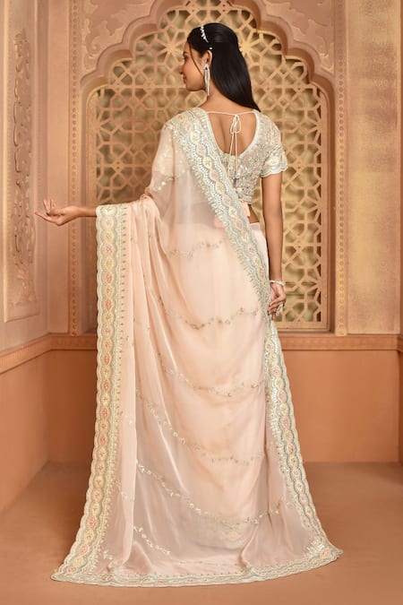 Shop_Kalighata_Peach Organza Sequins, Embroidery V-neck Saanvi Saree With Blouse _at_Aza_Fashions